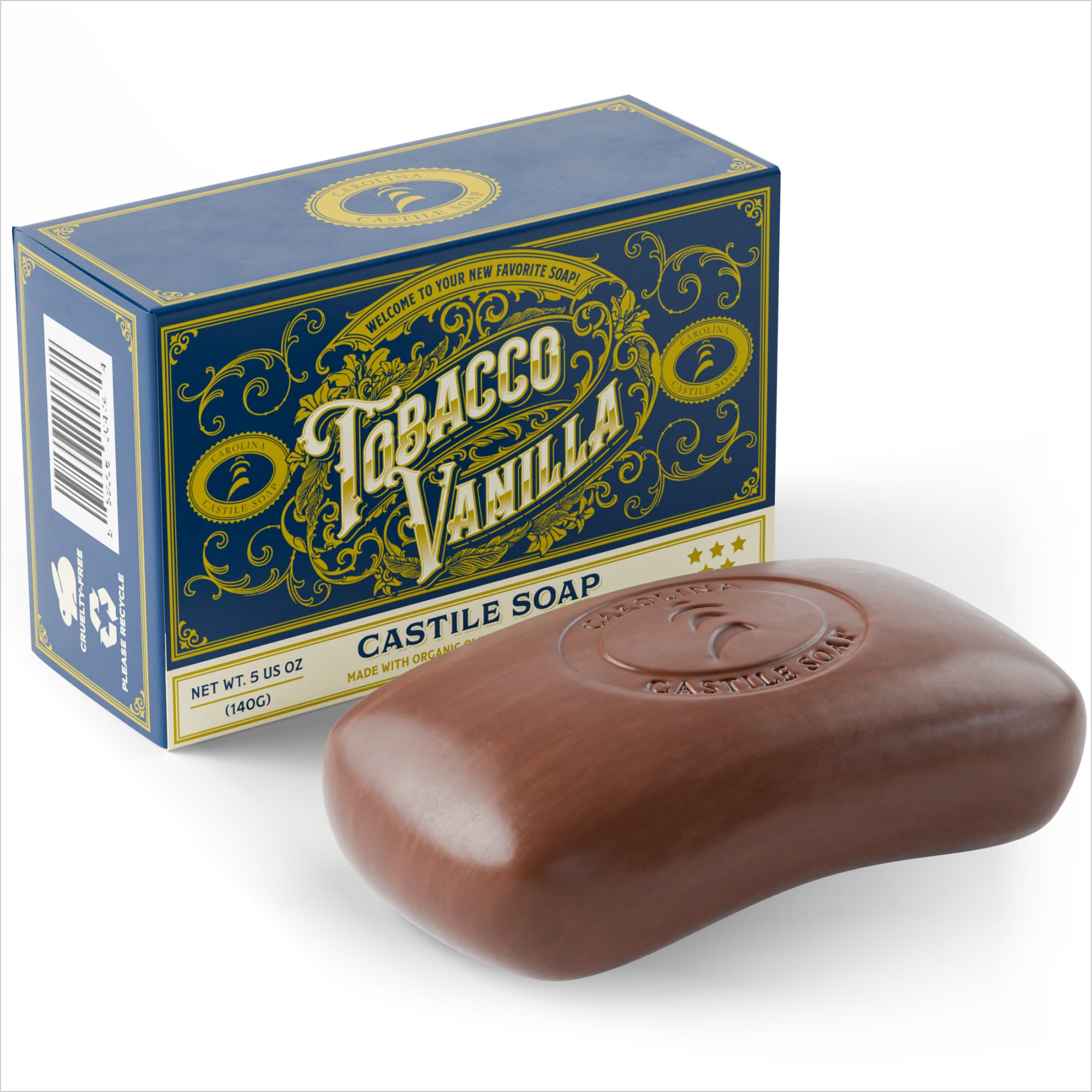 single bar of brown tobacco vanilla bar soap with Carolina Castile Soap logo imprinted on it. Behind it is the carton that would hold the bar of soap. The carton is navy blue and has various text including the title of the product "Tobacco Vanilla".