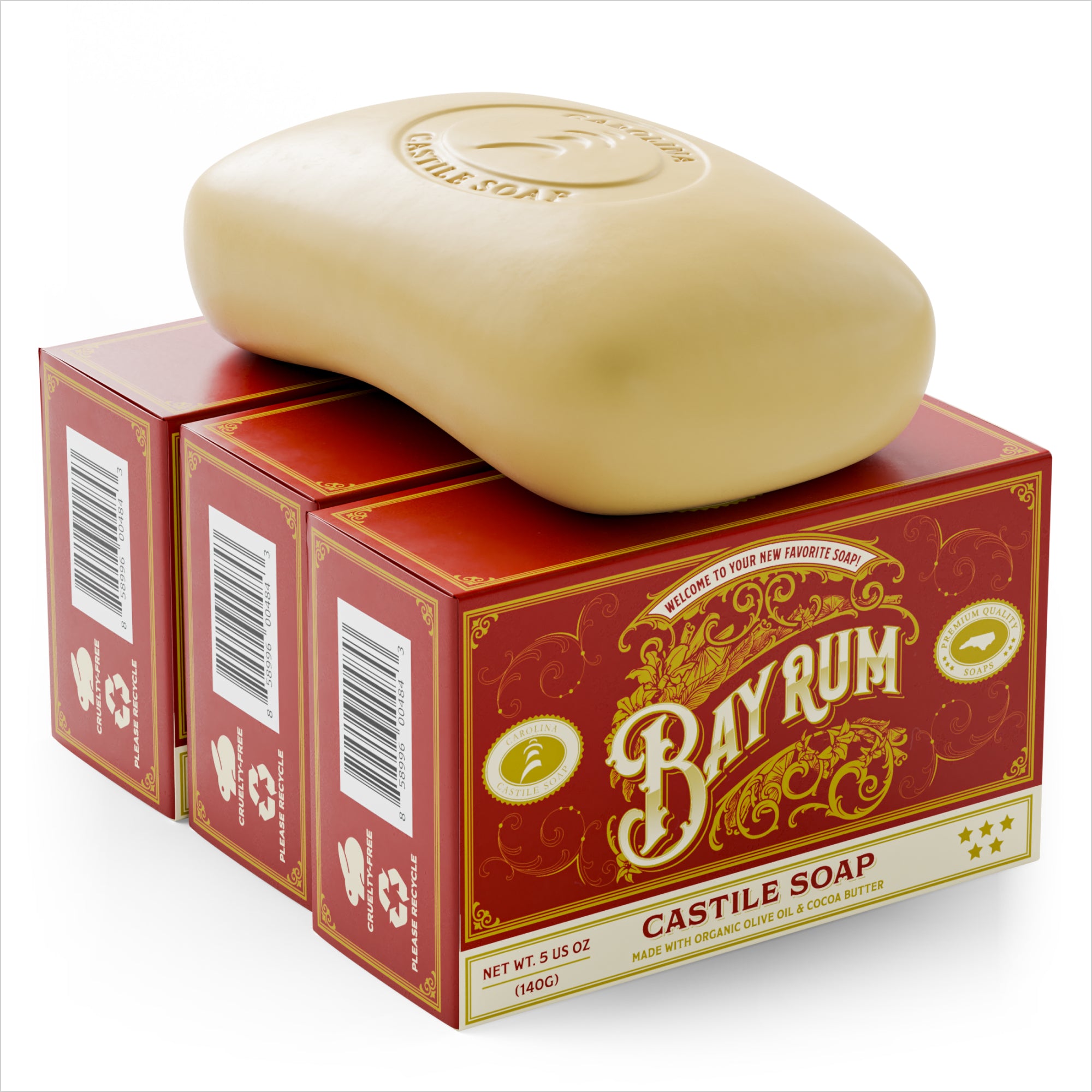 single bar of Castile Soap with Carolina Castile Soap logo stamped into it. The bar is sitting on top of 3 bar soap cartons arranged against each other. The cartons are dark red with the words "bay rum" and "Castile Soap" on it.