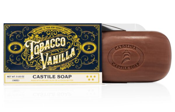 Single Bar of Tobacco Vanilla Castile Soap with brown bar of soap. The bar is partially extending out of its outer carton.
