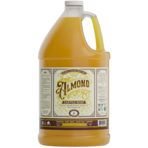 jug of Almond scented castile soap in a 1 gallon container. Liquid is golden colored and the label is a light tan and brown.