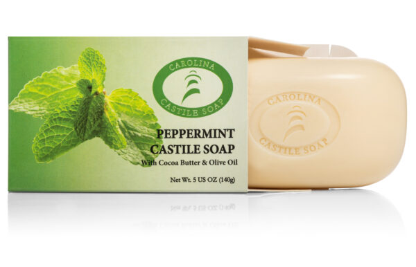 Bar of peppermint castile soap partially removed from outer carton.
